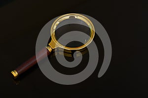 Magnifying glass isolated on a black background