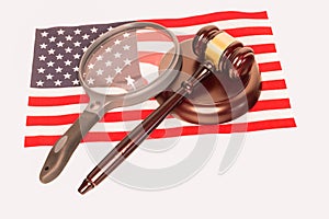 Magnifying Glass and Judges Gavel on The American Flag