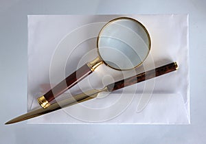 Magnifying glass and a letter opener