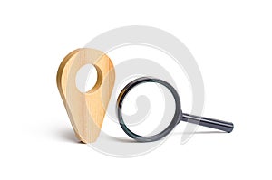 Magnifying glass location marker. Search for the right place or landmark. Navigation and orientation in the city or country.