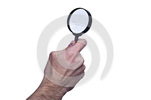 Magnifying Glass on the Male Hand