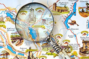 Magnifying glass on map of the Lake District.