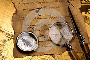 Magnifying glass and old map, colorful bright journey theme