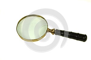 Magnifying glass over white backround