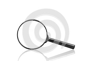 A magnifying glass is placed on a white background