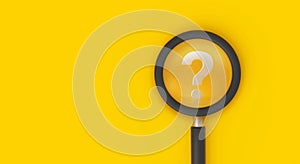 Magnifying glass with question mark on yellow background, search, question answer, problem or business solution concept