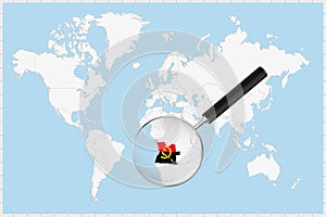 Magnifying glass showing a map of Angola on a world map