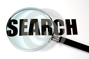 Magnifying glass and text - search
