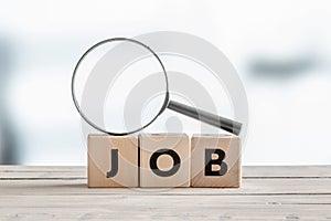 Magnifying glass on the word job
