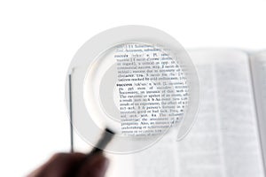 A magnifying glass on the word success