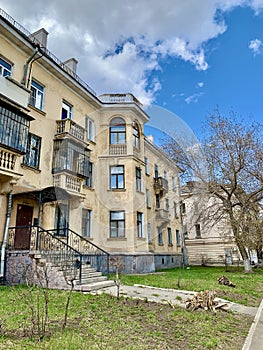 Magnitogorsk, Russia- 30/04/2020 Architecture of city; Old houses of provincial town in Russia with small architectural forms on b