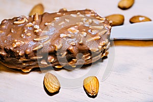 Magnum icecream with almond on wood