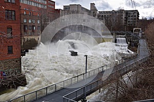 Magog river rushing water Sherbrooke downtown area near