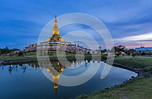 Maha Mongkol Bua Pagoda in Roi-ed Thailand at sunset