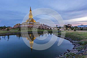 Maha Mongkol Bua Pagoda in Roi-ed Thailand at sunset.