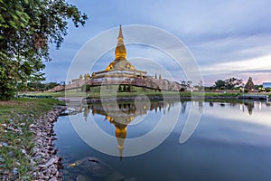 Maha Mongkol Bua Pagoda in Roi-ed Thailand at sunset