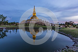 Maha Mongkol Bua Pagoda in Roi-ed Thailand at sunset.