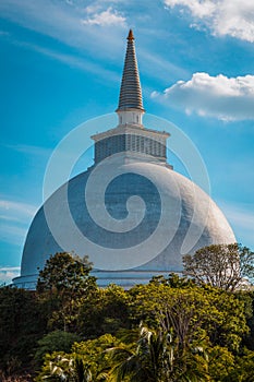 Mahaseya Dagoba Buddhist stupe in Mihintale, Sri Lanka, on sunset