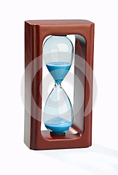 Mahogany sand timer isolated on white background