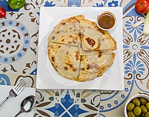 Mahyawa or mehyawa arayes and arias paratha bread with fermented fish sauce served in dish isolated on table top view of arabic