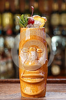 Mai tai cocktail in tiki glass close up