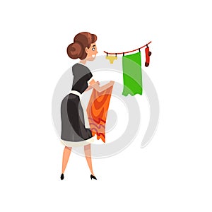 Maid hanging clean wet clothes out to dry, housemaid character wearing classic uniform with black dress and white apron