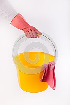 Maid holding bucket on white background