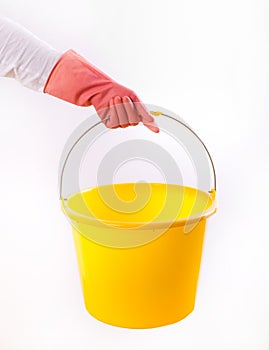 Maid holding bucket on white background