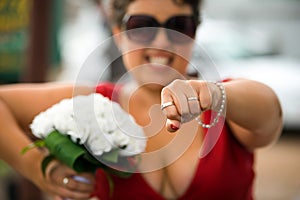 Maid of honour with wedding rings photo