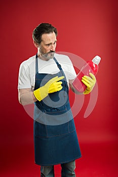 Maid or houseman cares about house. Spring cleaning. domestic helper. Commercial cleaning company concept. Bearded man photo