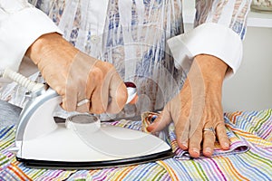 Maid Ironing Clothes