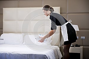 Maid Making Bed photo