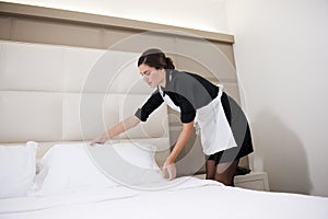 Maid Making Bed