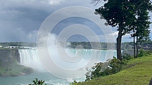 The maid of the mist emerging from the mist in front of Horseshoe falls