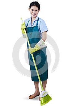 Maid sweeping the floor photo