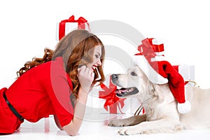 Maiden and labrador dog with Christmas gifts