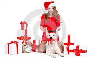 Maiden and labrador dog with Christmas gifts