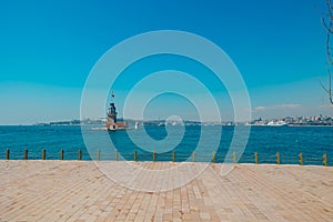 Maiden's Tower aka Kiz Kulesi view with cityscape of Istanbul photo