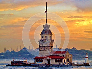 Maiden`s Tower in Istanbul and Old City in Background at Sunset