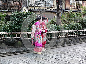 Kimono girls in Gion district, Kyoto Japan.