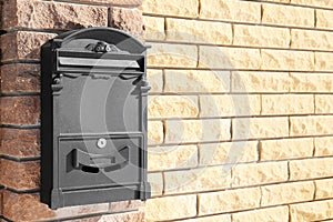 Mail box on fence outdoors