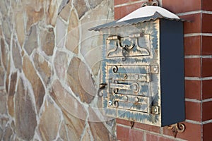 Mail box on fence outdoors