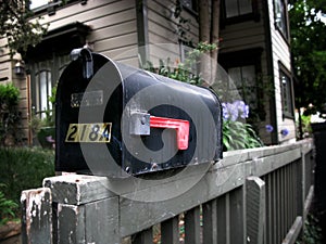 Mail box on a railing