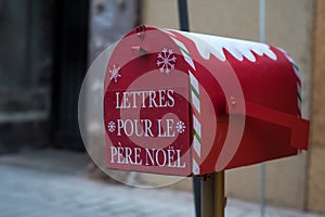 mail box with text in french : lettres pour le pere noel, traduction in english, letters forthe santa claus