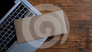 A envelope on laptop keyboard.