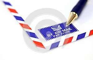 Mail envelope with pen