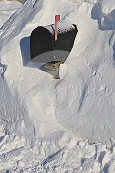 Mailbox buried in the deep snow
