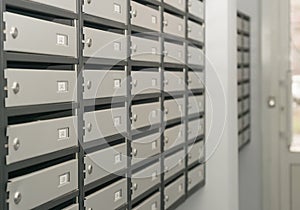 Mailboxes filled with numbers. In an apartment building  3