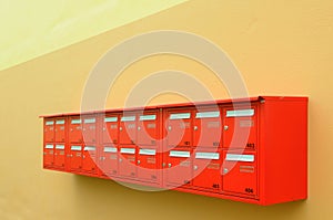 Some mailboxes on a wall