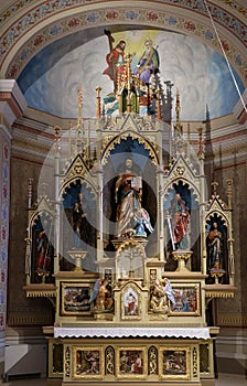 Main altar in the church of Saint Matthew in Stitar, Croatia photo